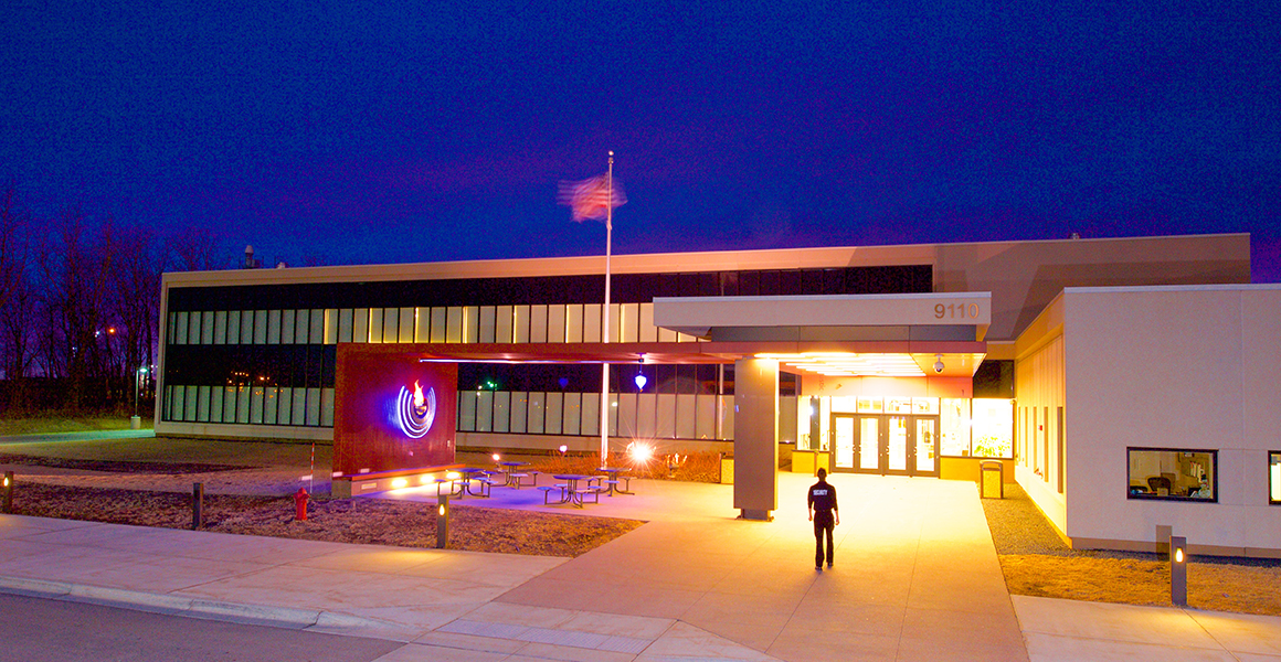 Evening photograph of Metro State University and Hennepin Technical College’s Public Safety and Police Science Center building.
