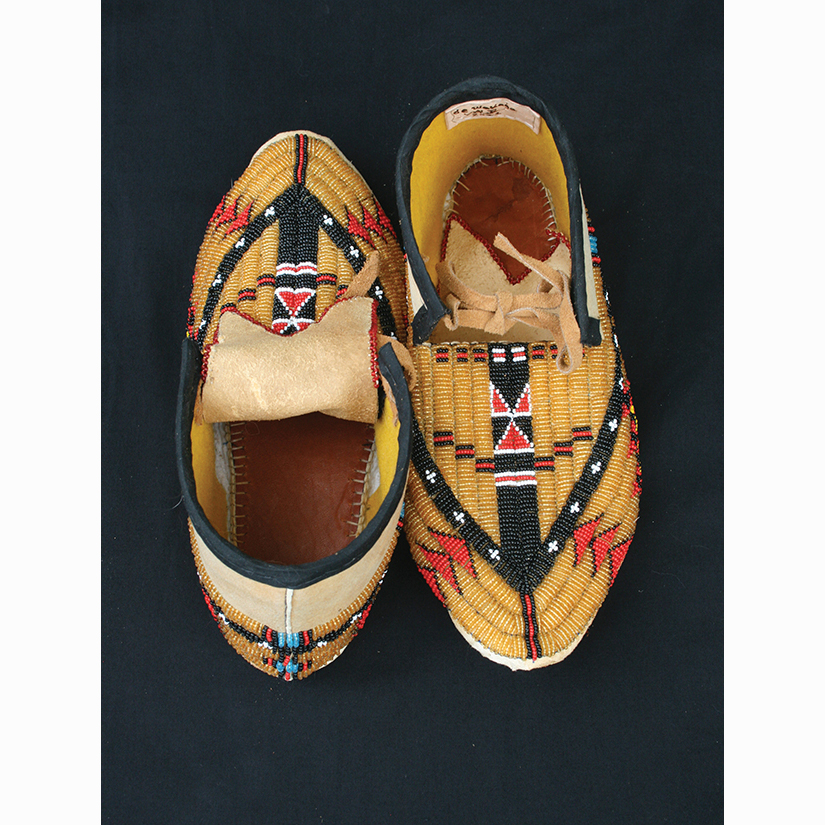 A pair of intricately beaded moccasins