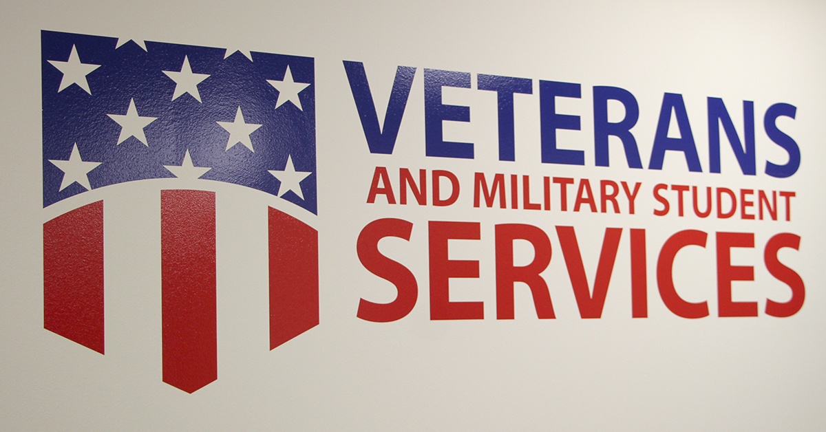 veterans and military student services words and badge shaped flag image