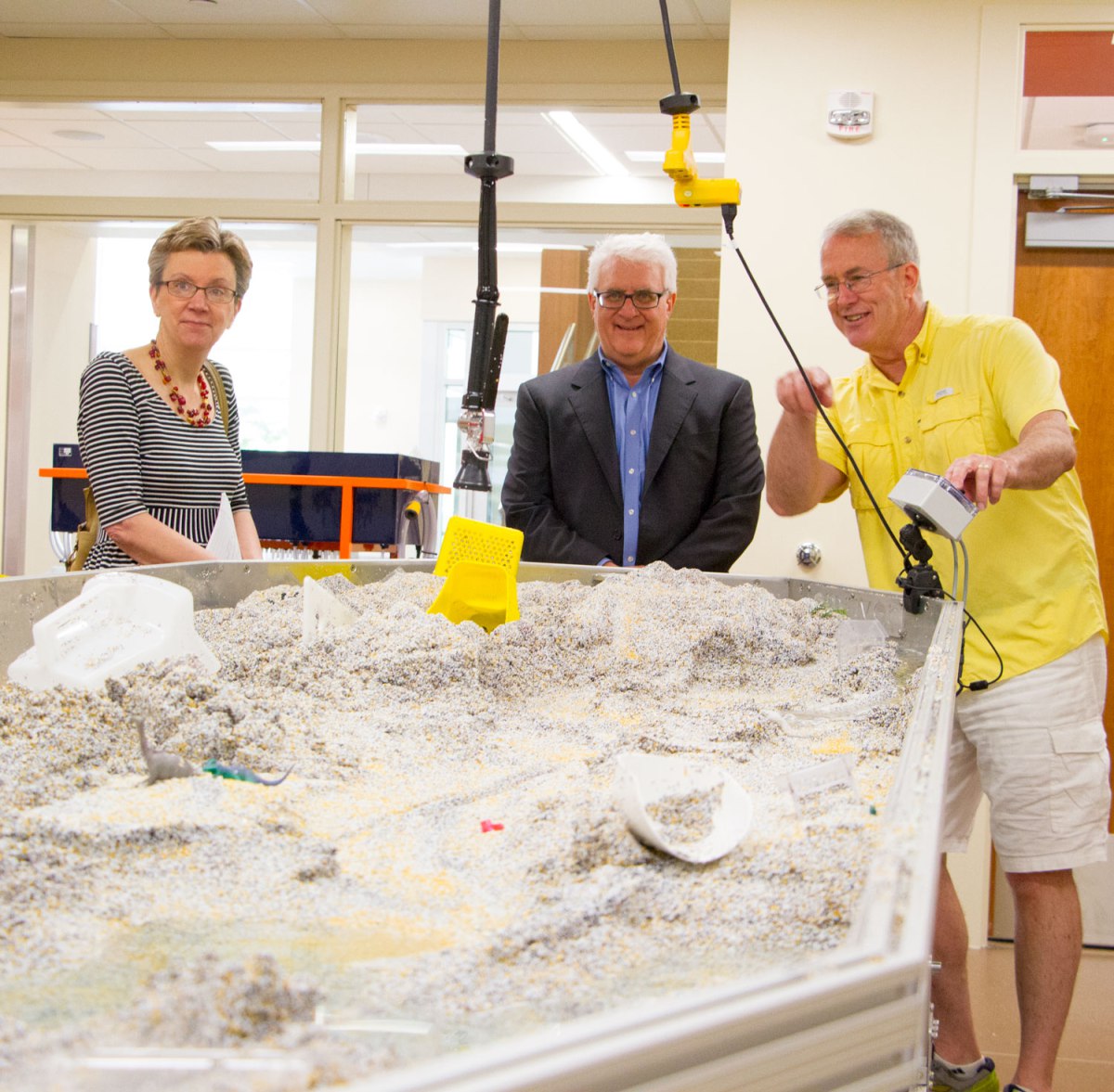 Associate professor John Schneider, right, explains how watersheds are studied during a tour of Metropolitan State University’s Science Education Center for editorial board member Pat Effenberger and editor Mike Burbach of the Saint Paul Pioneer Press. Effenberger and Burbach visited the Saint Paul Campus to meet with incoming President Ginny Arthur, June 16, 2016.