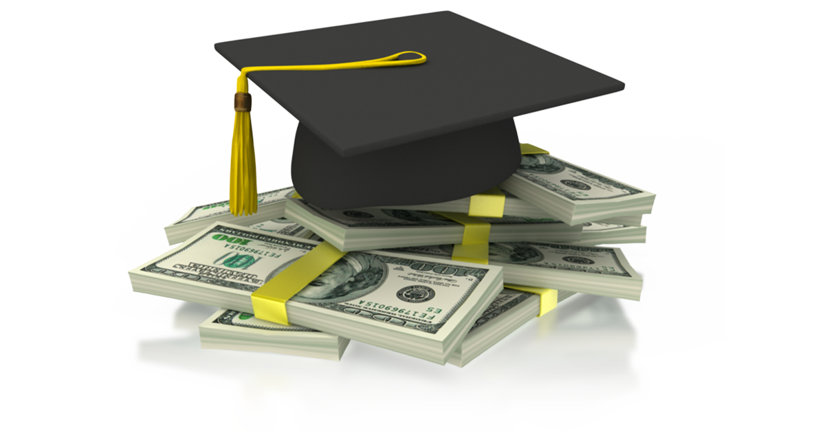 Graduation cap atop stacks of money
