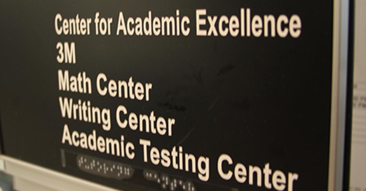 Sign for the Center for Academic Excellence, Writing Center, and Academic Testing Center.