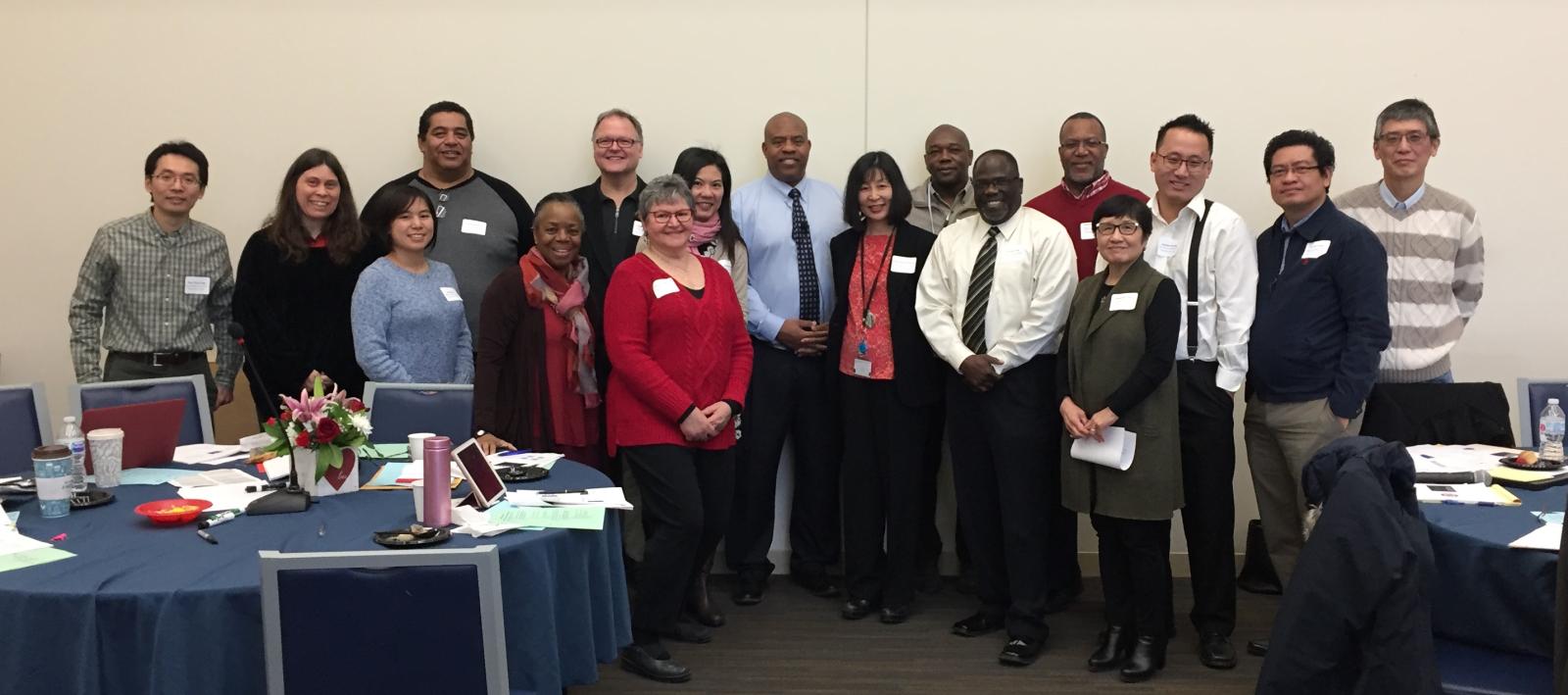 group of Metro State faculty stand for a group picture