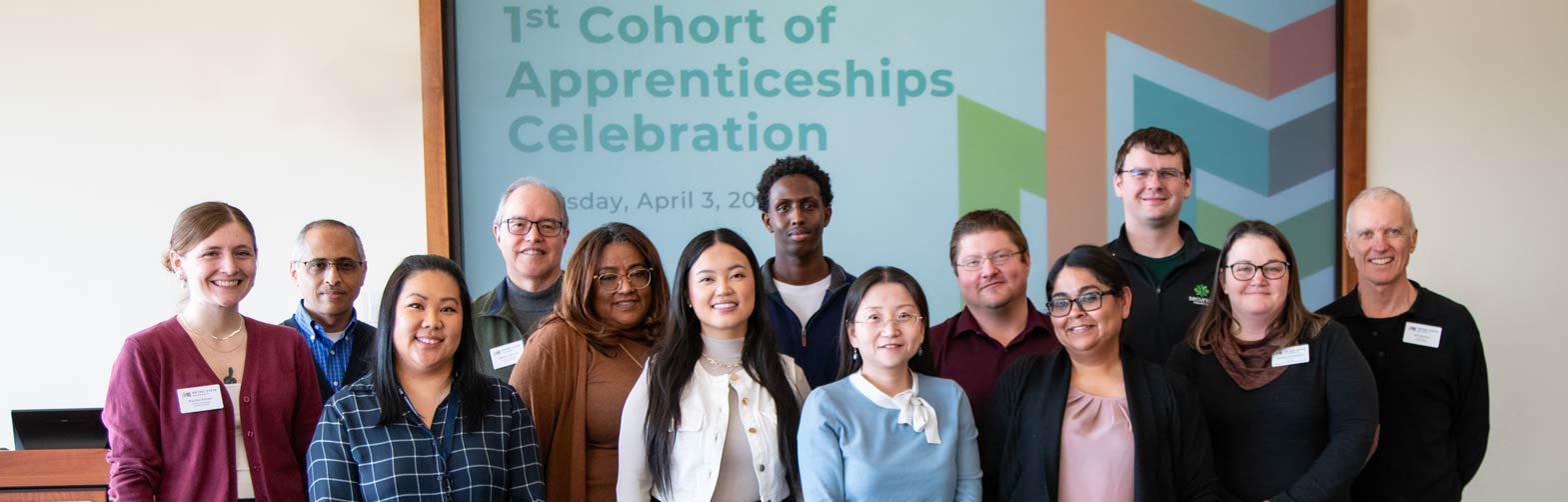 A group poses for Metro State's first Apprenticeship cohort celebration