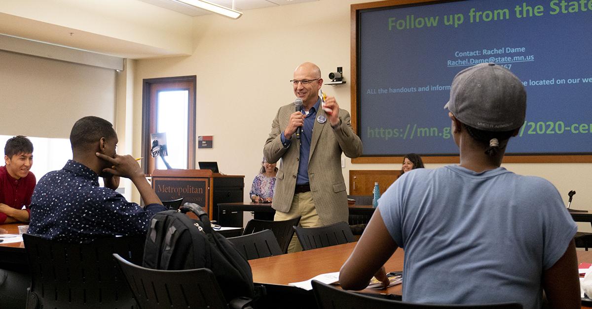 Professor, Matt Filner, speaking and inviting attendee to read the Census information in the U.S. Constitution