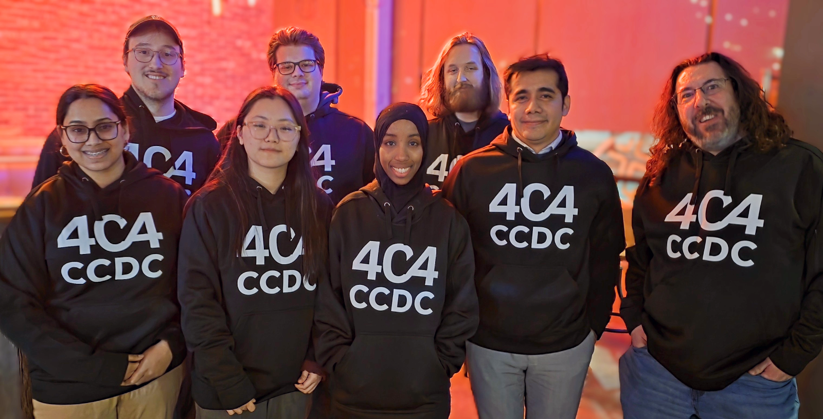 Members of Team Metro pose for a group picture