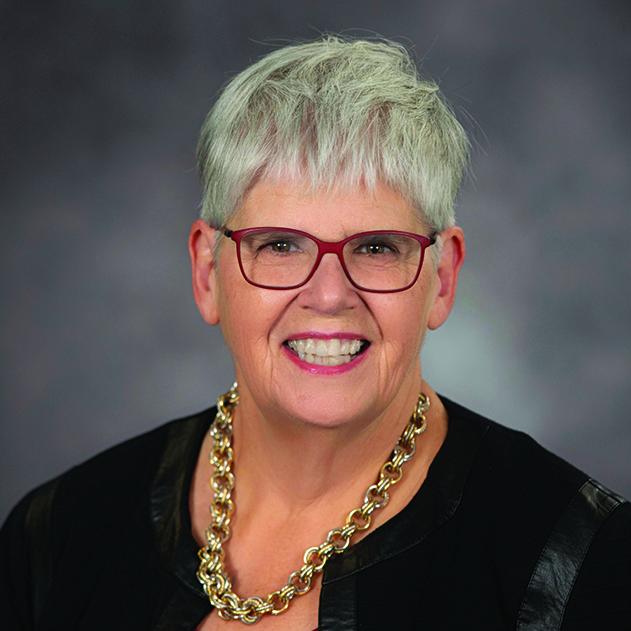 President Ginny Arthur posed for a portrait