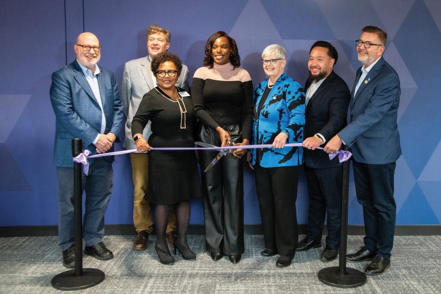 Rep. Frank Hornstein, Chancellor Scott Olson, Pres. Sharon Pierce, Carisha Thomas, Pres. Ginny Arthur, Rep. Fue Lee, and Sen. Scott Dibble at the MEC ribbon cutting ceremony.